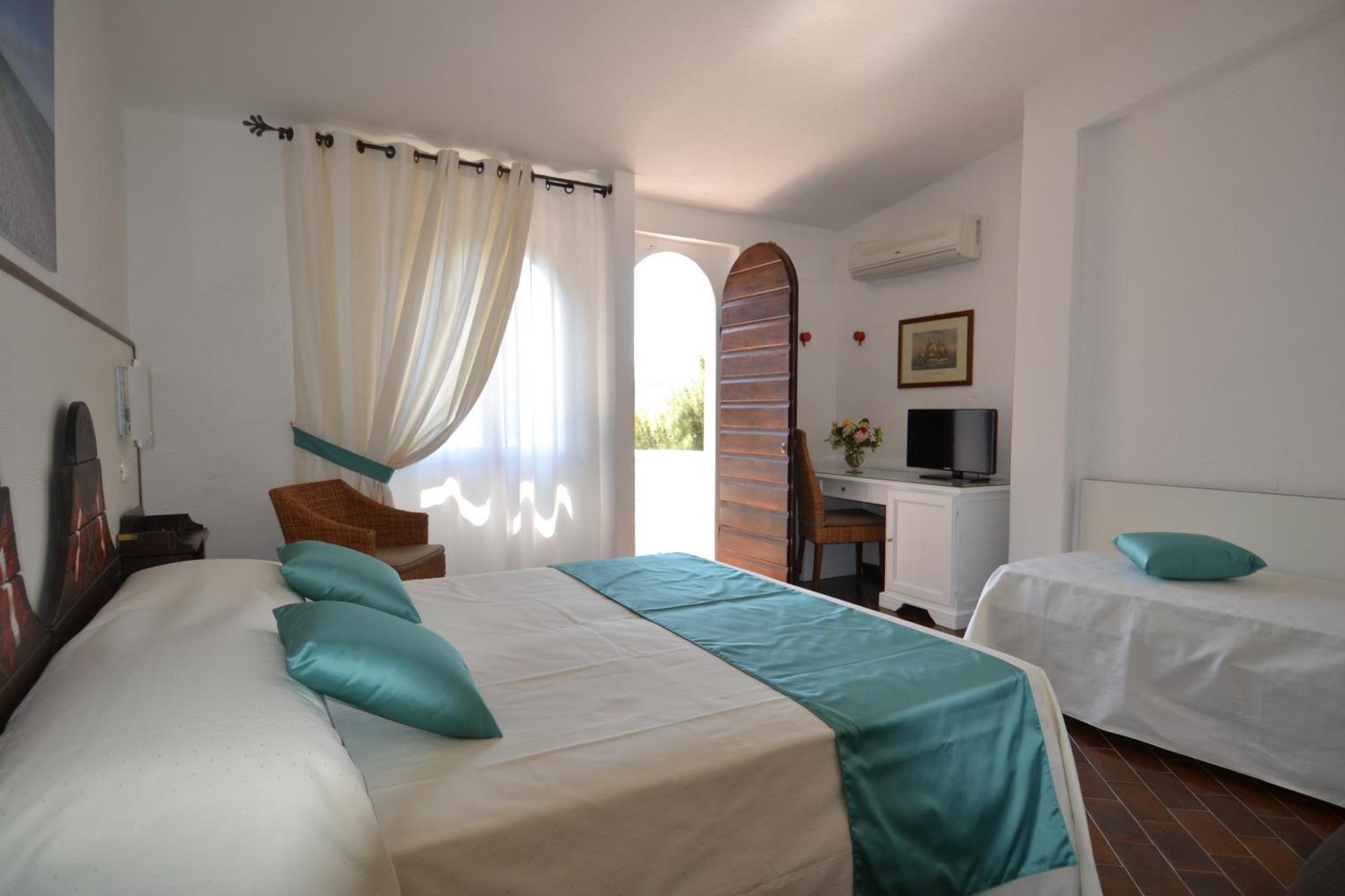 Hotel Cala Di Mola Порт-Аццурро Номер фото